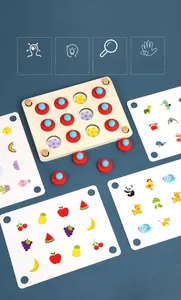 Detail view of wooden memory game set including board, red pieces, and activity cards