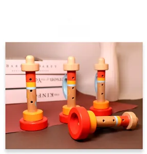 Detail view of colorful wooden trumpet toys for toddlers with smooth polished edges