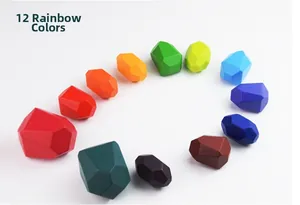Detailed view of 12-piece colorful wooden stacking stones with geometric faceted surfaces