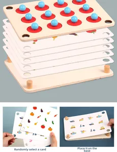 Detailed view of kids memory game pieces with wooden board and blue pawn pegs