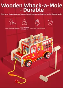 Detail view of fire truck wooden mole toy with dual hammers for toddler motor skills