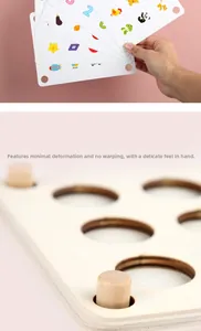 Detailed macro view of smooth wooden memory game pins and colorful educational cards