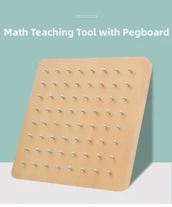 Macro shot of a wooden geoboard with metal pegs for children's geometry and math learning