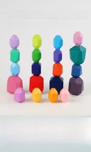 Colorful wooden balancing stones with smooth faceted surfaces for creative stacking play
