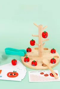 Close-up of wooden apple tree math toy with numbers and addition flashcards