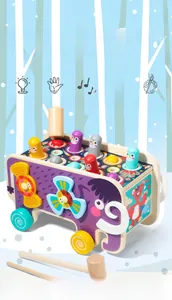Detail of wooden mammoth whack-a-mole toy with colorful penguins and rotating gears