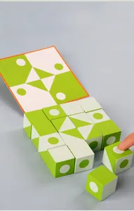 Macro detail of wooden logic cubes showing geometric patterns and reference puzzle card