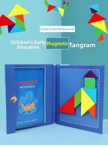 Close-up of colorful magnetic tangram wooden puzzle pieces on a blue display board