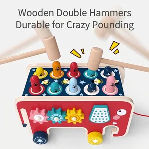 Elephant-shaped wooden whack-a-mole toy with colorful gears, dual hammers and pull string