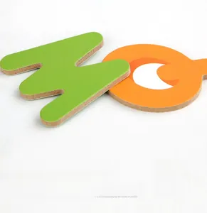 Detail of colorful wooden alphabet blocks showing smooth rounded edges and letter M