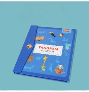 Detail of portable magnetic wooden tangram puzzle in a blue book-style folding design