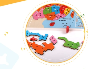 Close-up of 3D wooden China map puzzle pieces showing province details and texture