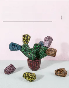 Detail view of colorful wooden cactus building blocks with unique crackle texture