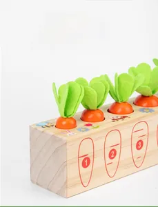 Detail view of wooden base with numbers and felt carrots for toddler cognitive learning