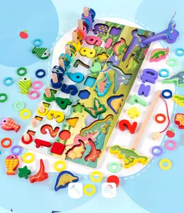 Detail of wooden educational board with magnetic fishing game and dinosaur number puzzles