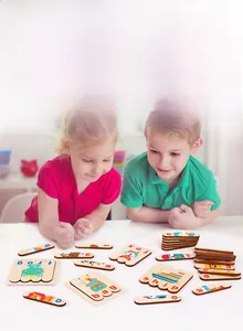 Kids playing with wooden word puzzles featuring cartoon frog and ship illustrations