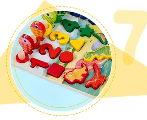 Close-up of wooden puzzle board with colorful dinosaur shapes and numeric blocks