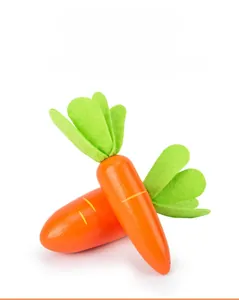 Detailed view of polished wooden carrots with felt leaves and smooth edges for safe play