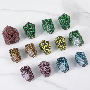 Colorful geometric wooden stacking stones toy with crackle texture on marble background