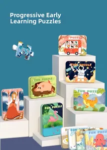 Detail of metal tin boxes for educational jigsaw puzzles featuring cartoon dinosaur prints