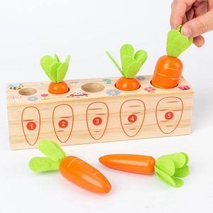 Wooden carrot sorting toy for toddlers with numbered holes and varied carrot sizes