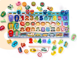 Macro shot of multi-functional wooden puzzle board with colorful numbers and animals
