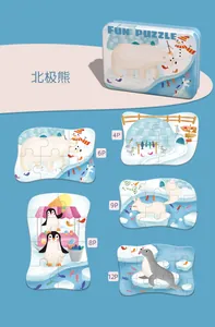 Detail view of five polar animal puzzles with metal storage box for children
