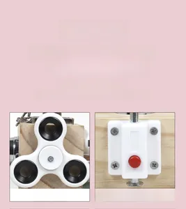 Detail view of wooden busy cube featuring a fingertip spinner and spring bolt for kids