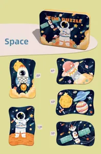 Space-themed puzzle set detail showing yellow metal tin box and various jigsaw pieces