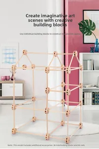 Detail showing 26 wooden connectors and 46 sticks forming a DIY castle house frame