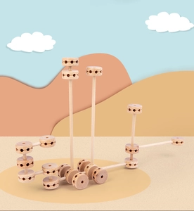 Detail of DIY wooden building blocks set showing rod and connector assembly for kids