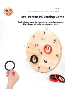 Detail of wooden ring toss board with scoring numbers and hooks for family game night