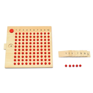Montessori multiplication board with wooden 10x10 grid, red beads, and number cards