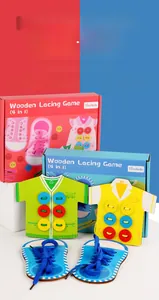 Close-up of wooden lacing boards for learning to tie shoelaces and button shirts