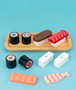 Macro detail of wooden sushi toy set with magnetic connection on a blue background