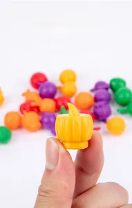 Detailed view of colorful miniature wooden fruit and vegetable toys for kids sorting games