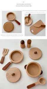 Detailed view of durable beech wood play kitchen pots, pans and utensils for kids