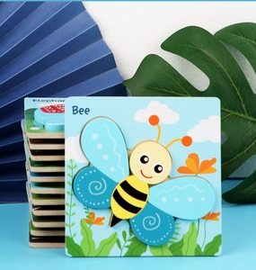 Vue détaillée de puzzles 3D en bois épais pour enfants avec motifs d'abeille et éléphant