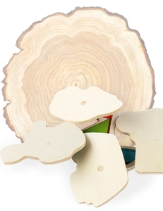 Detail of natural wood puzzle pieces with clear grain texture and smooth rounded edges