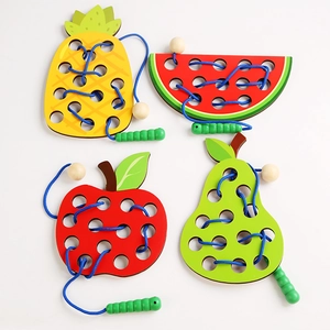 Wooden fruit threading toys for toddlers featuring apple pear pineapple and watermelon