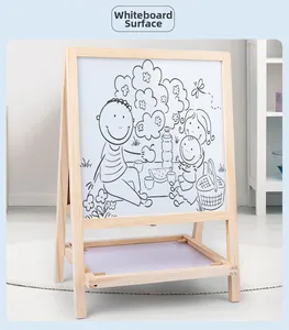 Detail of solid wood kids easel with white magnetic drawing board and storage tray