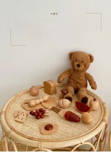 Detailed 30pcs wooden play food set featuring toy fruits and vegetables on a woven tray