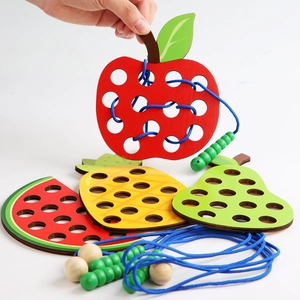 Wooden fruit lacing toy set for toddlers with apple and pineapple threading shapes