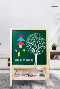 Detailed view of kids wooden magnetic easel with colorful geometric shapes and alphabet magnets