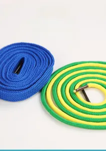 Detail of colorful braided cotton laces for educational threading boards with reinforced tips