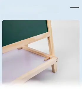 Close-up of pine wood joint and support structure on children's magnetic easel