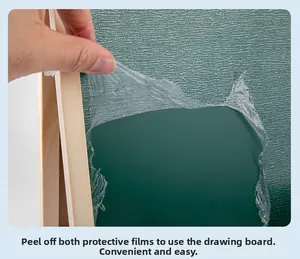 Detail of peeling off the double-sided protective film from the green wooden easel board