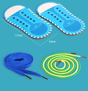 Detailed view of wooden shoe lacing boards measuring 17.5cm by 8.5cm for kids