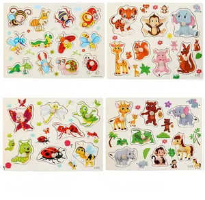 Set of four wooden Montessori puzzles featuring animals and insects with easy-grip pegs