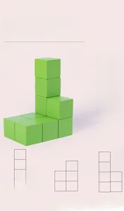 Macro view of green wooden cubes for geometric spatial logic and 3D view learning
